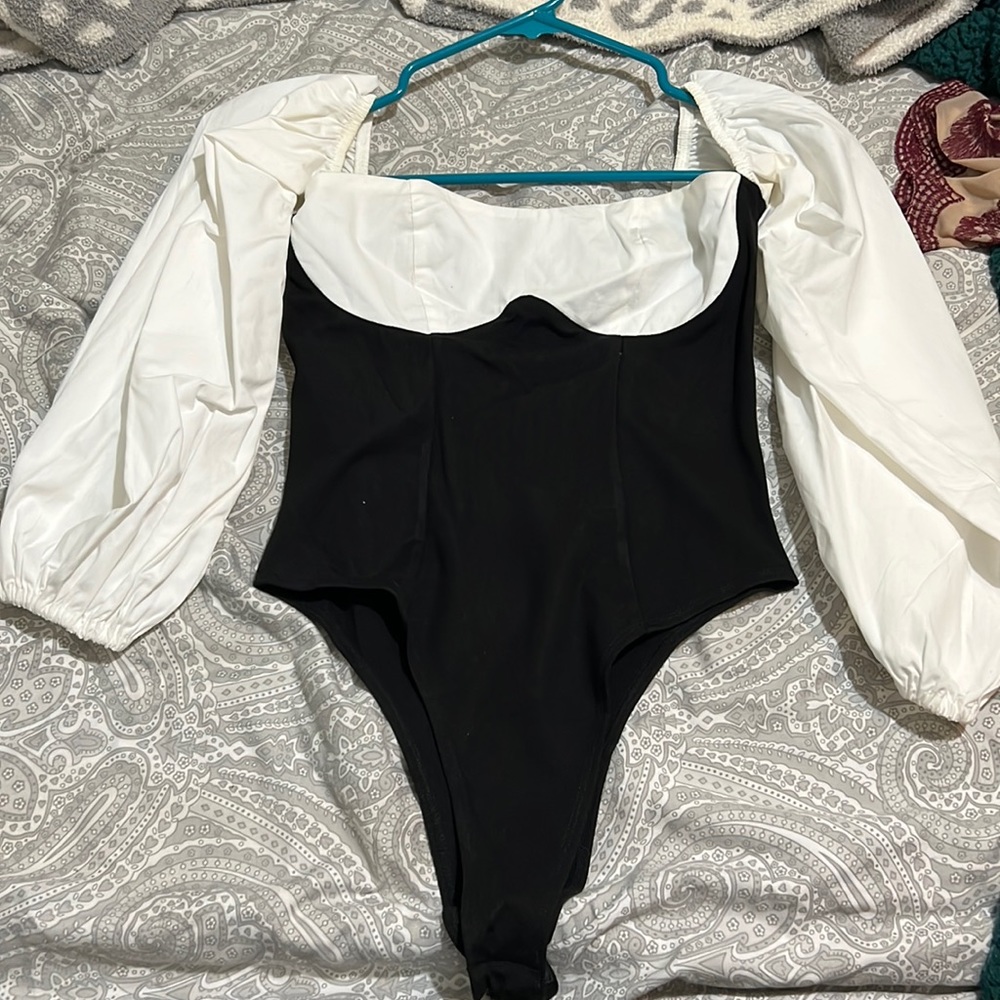 Black and white bodysuit.